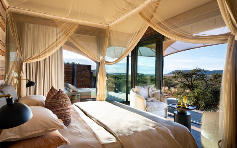 A bed with a mosquito net offers protection against mosquitoes carrying malaria.