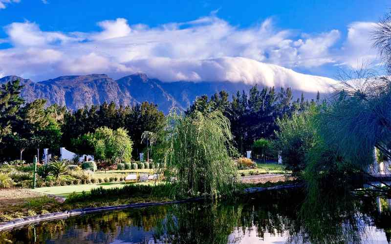 Dramatic cloud on the mountains near Franschhoek.Perfect for horse riding.