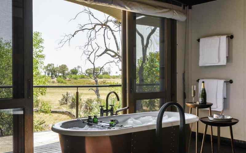 Okavango Delta Safari- bath with a view from a luxury lodge