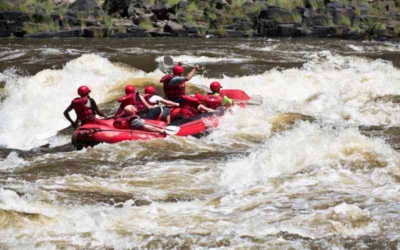 White water rafting over the rapids of the Zambezi. This is part of the Victoria Falls bucket list  adventure.